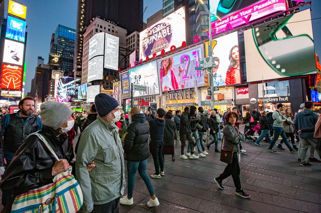 In Times Square, some people wear masks amid coronavirus outbreak.